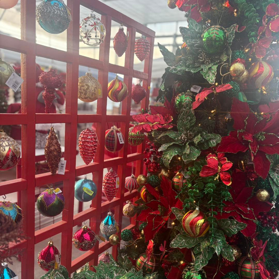 Decorated Christmas tree with ornaments in a store setting